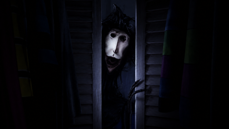 The creature's masked face peering out from between half-open closet shutters in a dark room.